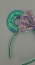 Load and play video in Gallery viewer, Teal Sequined Headband with Lilac Sequined Bow
