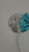 Load and play video in Gallery viewer, Silver Princess Themed Sequined Ear Headband with Blue Sequined Bow
